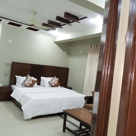 Hotel Al Markaz Исламабад Экстерьер фото