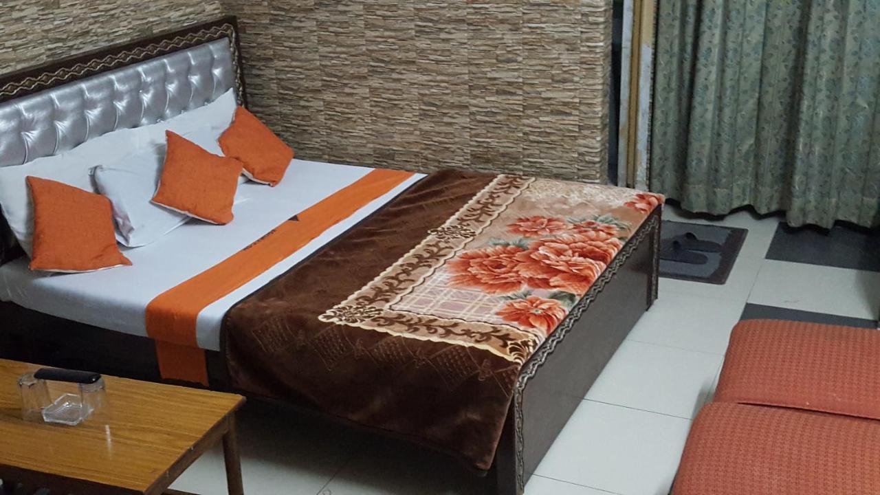 Hotel Al Markaz Исламабад Экстерьер фото