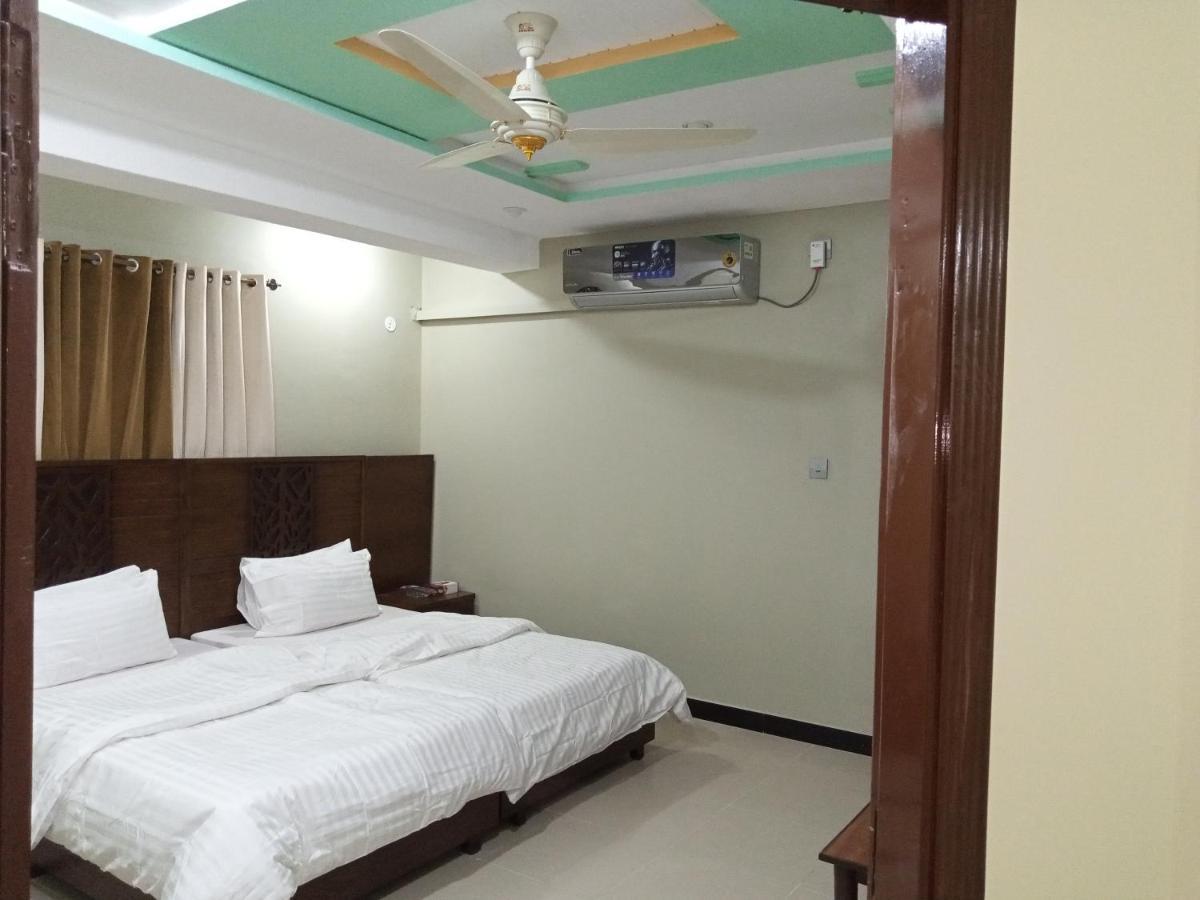 Hotel Al Markaz Исламабад Экстерьер фото