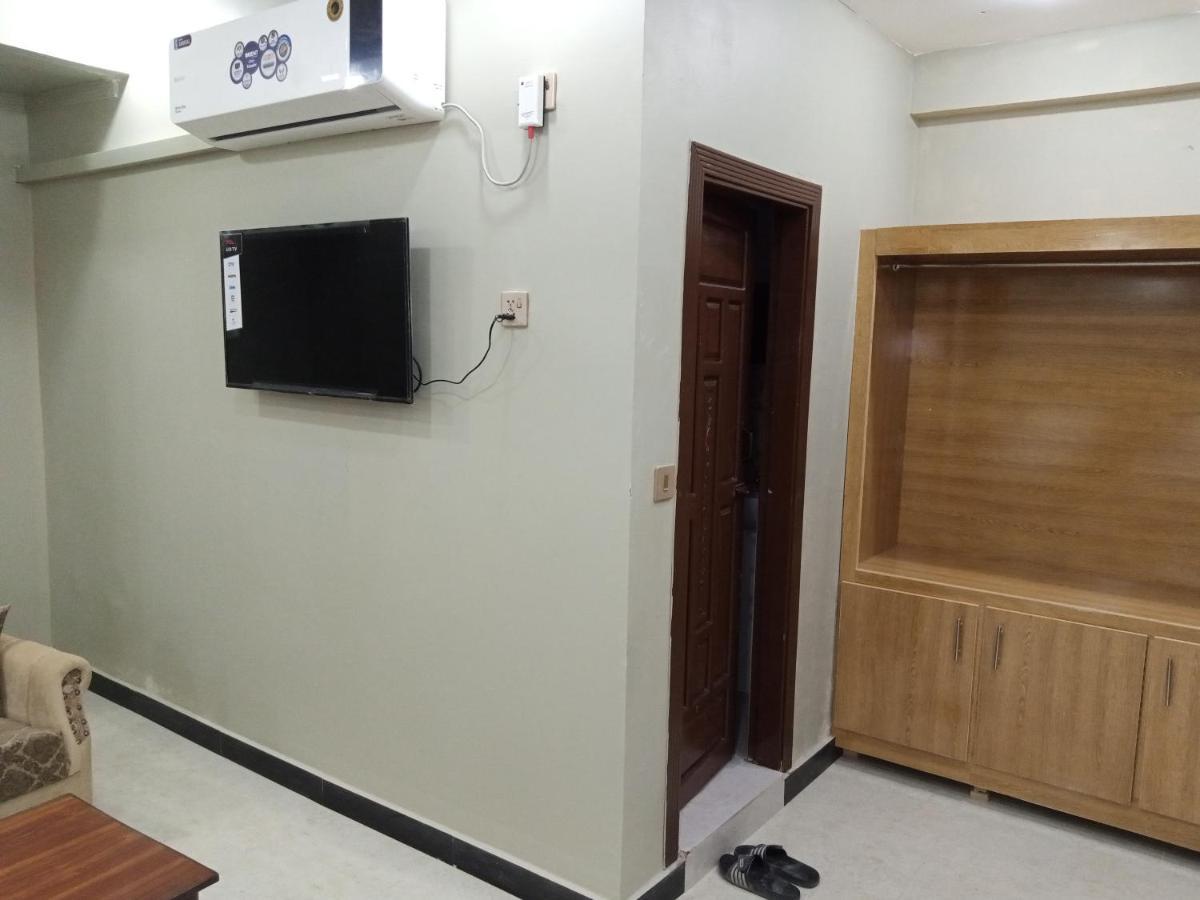 Hotel Al Markaz Исламабад Экстерьер фото